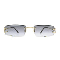 Front view of Cartier CT0465S001 grey gradient rimless sunglasses men with gold bridge bar and Cartier script on left lens