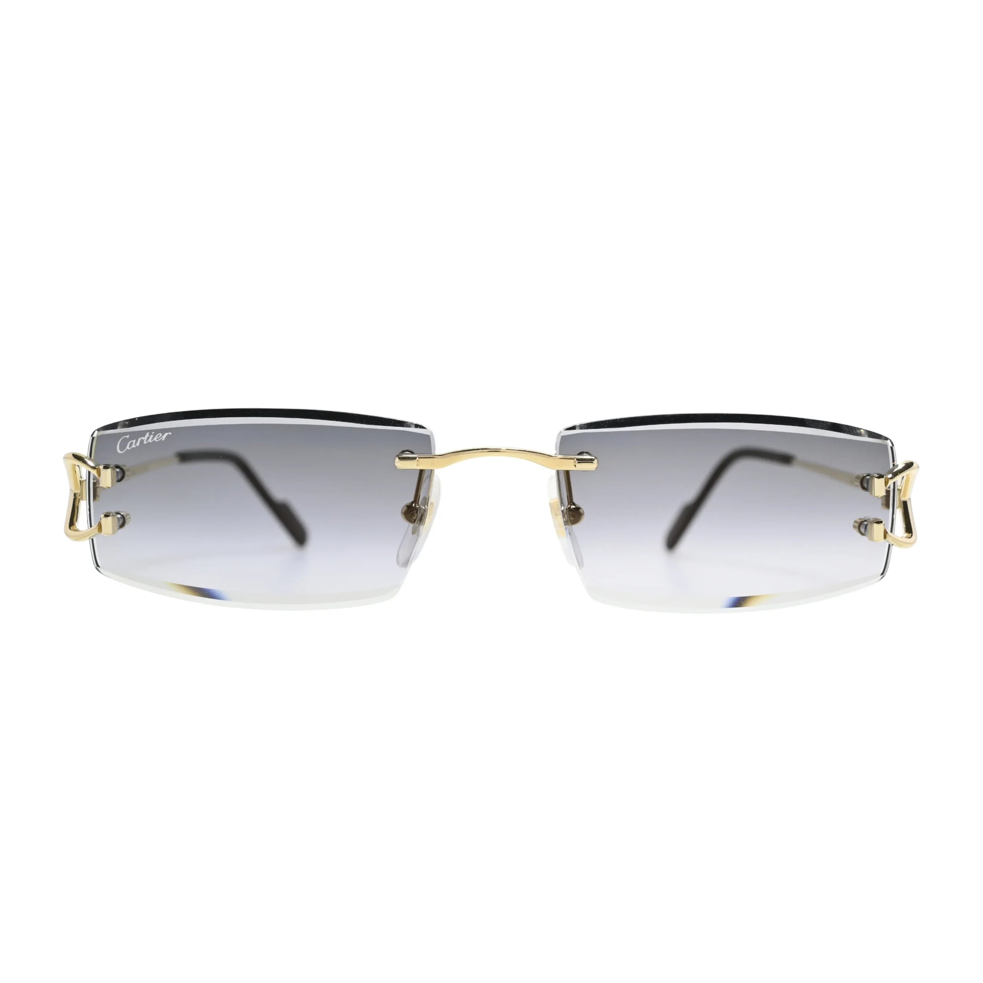 Front view of Cartier CT0465S001 grey gradient rimless sunglasses men with gold bridge bar and Cartier script on left lens