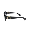 Side profile of Cartier CT0546S001 with gold panther ring detail and Cartier script at temple tip