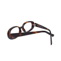 Folded view showing tortoise plastic oval