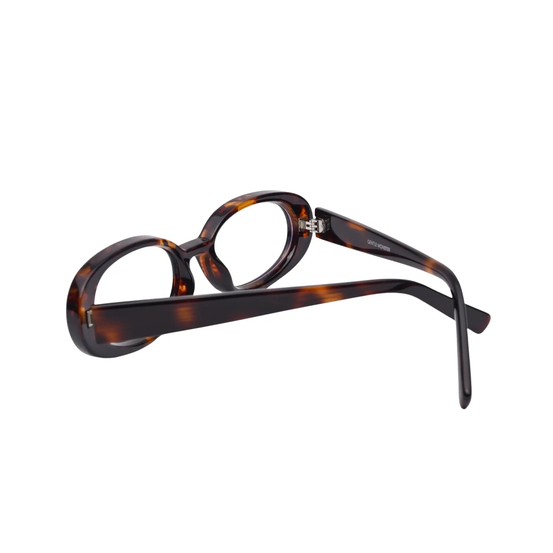 Folded view showing tortoise plastic oval