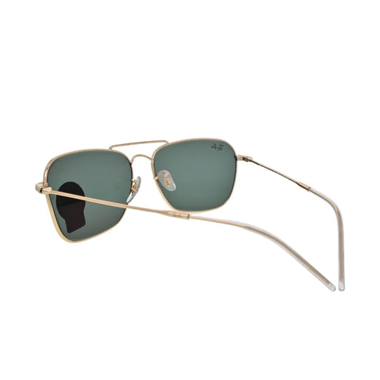 Ray-Ban Caravan Reverse RBR0102S gold metal sunglass — rear view showing slim temple arms, clear translucent plastic tips and inverted green lens profile