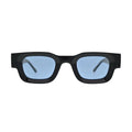 Front view of chunky black rectangle sunglasses with light sky blue lenses and clean integrated bridge showing thick block frame