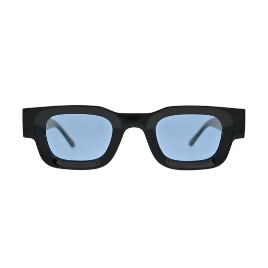 Front view of chunky black rectangle sunglasses with light sky blue lenses and clean integrated bridge showing thick block frame