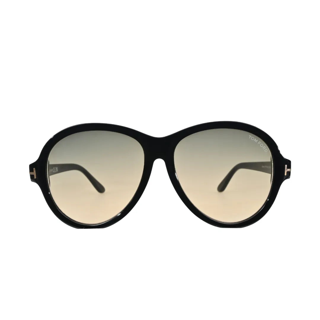 Tom Ford Camryn TF1033 01B front-facing view showing oversized round black frame and warm beige gradient lenses