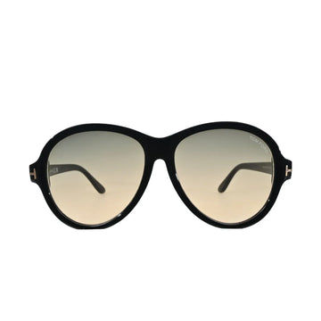 Tom Ford Camryn TF1033 01B front-facing view showing oversized round black frame and warm beige gradient lenses