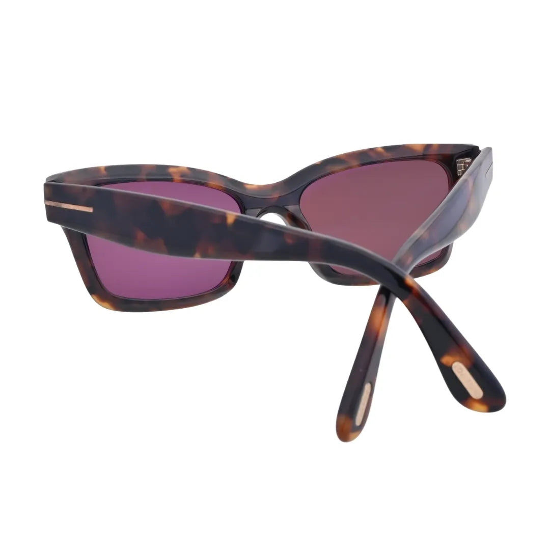 Tom Ford TF1085 52U tortoise acetate sunglasses featuring gold T temple hardware