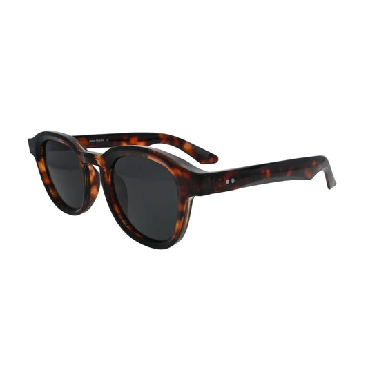 Round tortoise sunglasses side angle view — chunky tortoiseshell acetate frame with keyhole bridge, classic vintage design for men and women