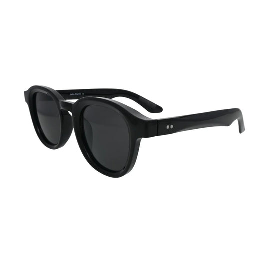 Three-quarter side angle view of black panto round sunglasses showing thick acetate-style temples and silver hinge rivets