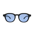 Front view of black frame blue lens panto sunglasses showing cornflower blue flat lenses and thick black acetate-style frame