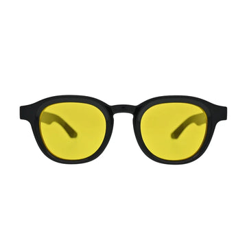 Front view of black frame yellow lens panto sunglasses showing solid yellow flat lenses in thick black acetate-style frame