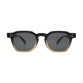 Front view of two tone black to amber gradient square frame sunglasses with flat smoke lenses and silver rivet temple detail