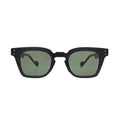 Front view of black square sunglasses with green lenses showing thick frame, notched cutout bridge, and silver rivet detail on temples
