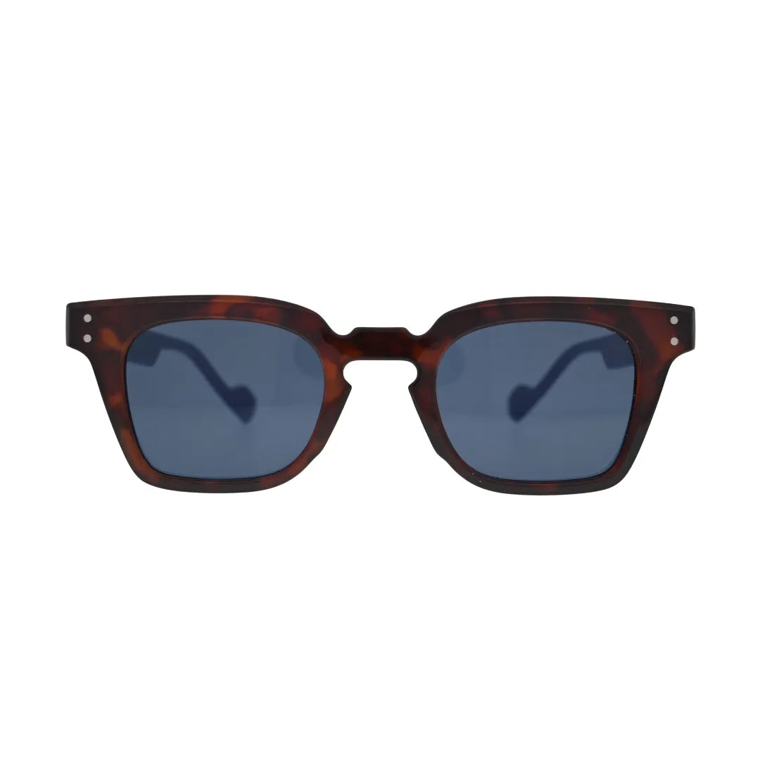 Front view of thick frame tortoise sunglasses featuring a keyhole bridge and dark lenses.