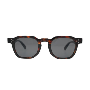 Front view of all-over tortoise shell square sunglasses with chamfered corners, notched bridge and dark smoke grey flat lenses