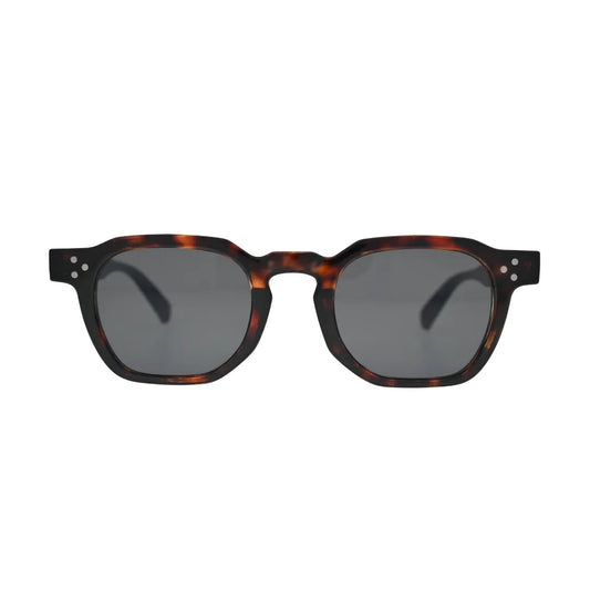Front view of all-over tortoise shell square sunglasses with chamfered corners, notched bridge and dark smoke grey flat lenses