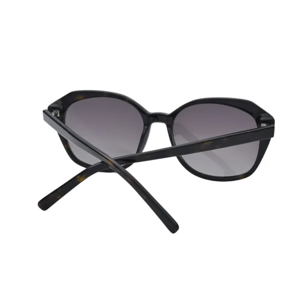 Front-facing view of black oversized square sunglasses featuring soft grey gradient lenses and a structured acetate frame. The oversized design offers full eye coverage while enhancing facial features, making these sunglasses a stylish and functional choice for women seeking modern eyewear, sun protection, and a bold fashion statement.