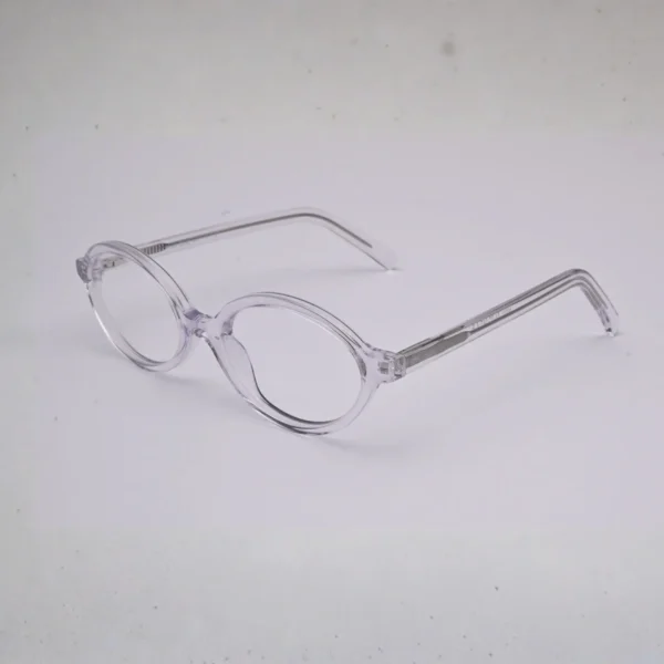 Side view of clear blush-pink full frame with visible metal core in temples (S036)