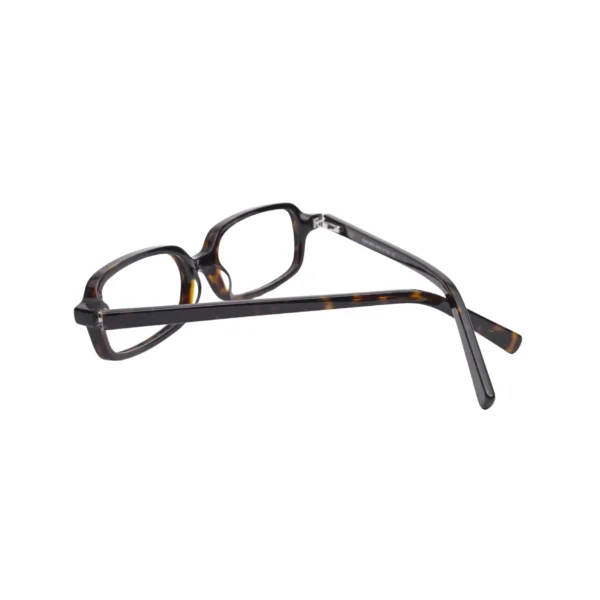 Angled view showing rectangular rim and hinge detail