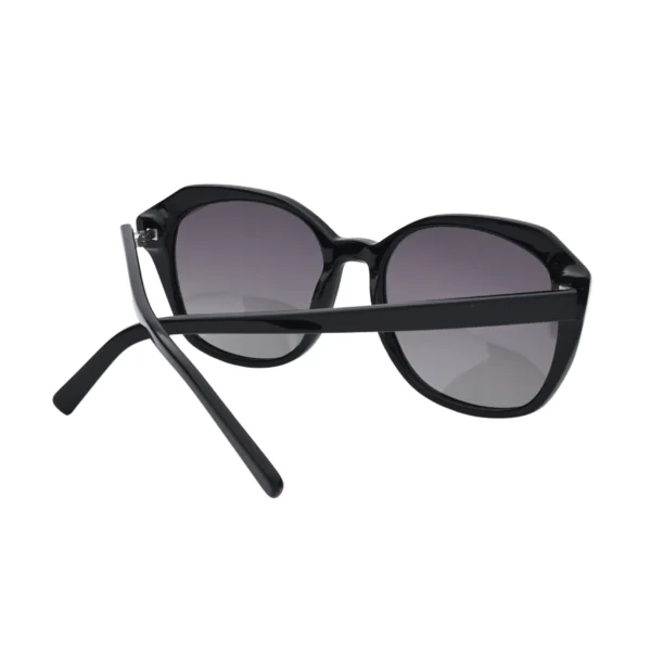 Back view of black oversized square sunglasses with crossed temples and gradient lenses