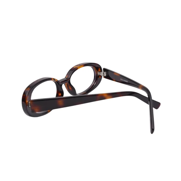 Folded view showing tortoise plastic oval