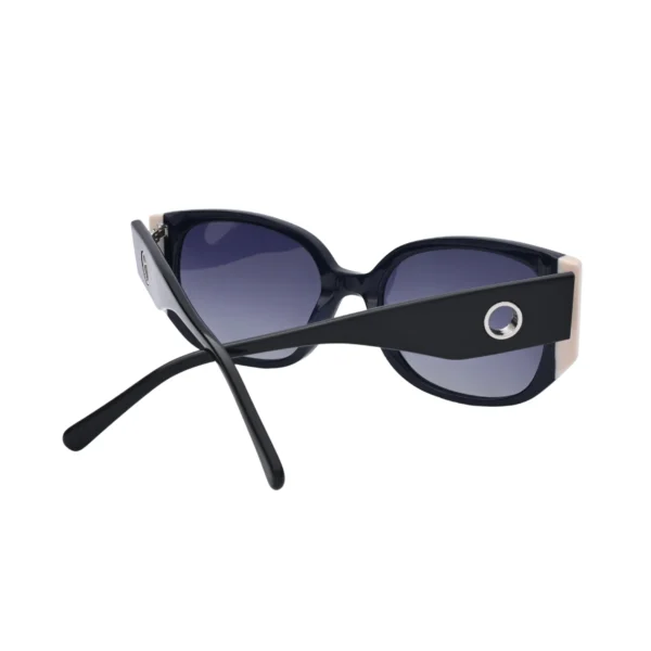 Back view of black oversized square sunglasses with crossed temples and metal detail