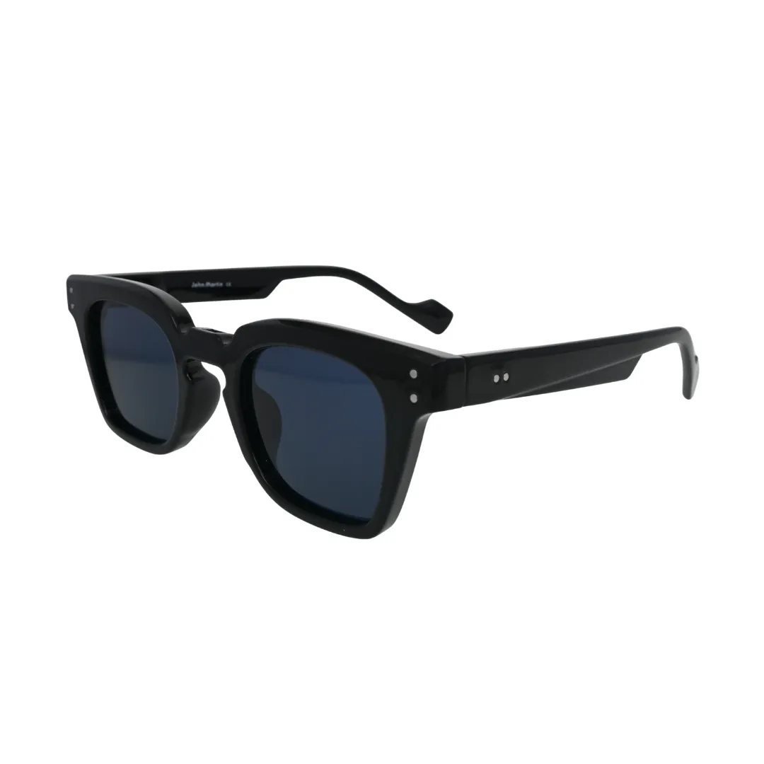 Three-quarter side view of chunky glossy black square sunglasses with dark navy blue lenses and silver rivet hinge detail