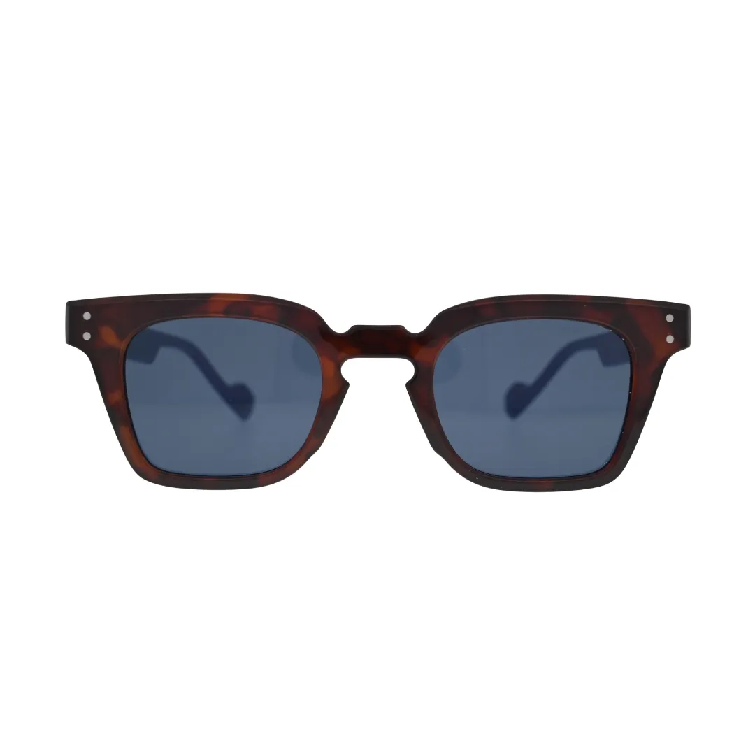 Front view of thick frame tortoise sunglasses featuring a keyhole bridge and dark lenses.