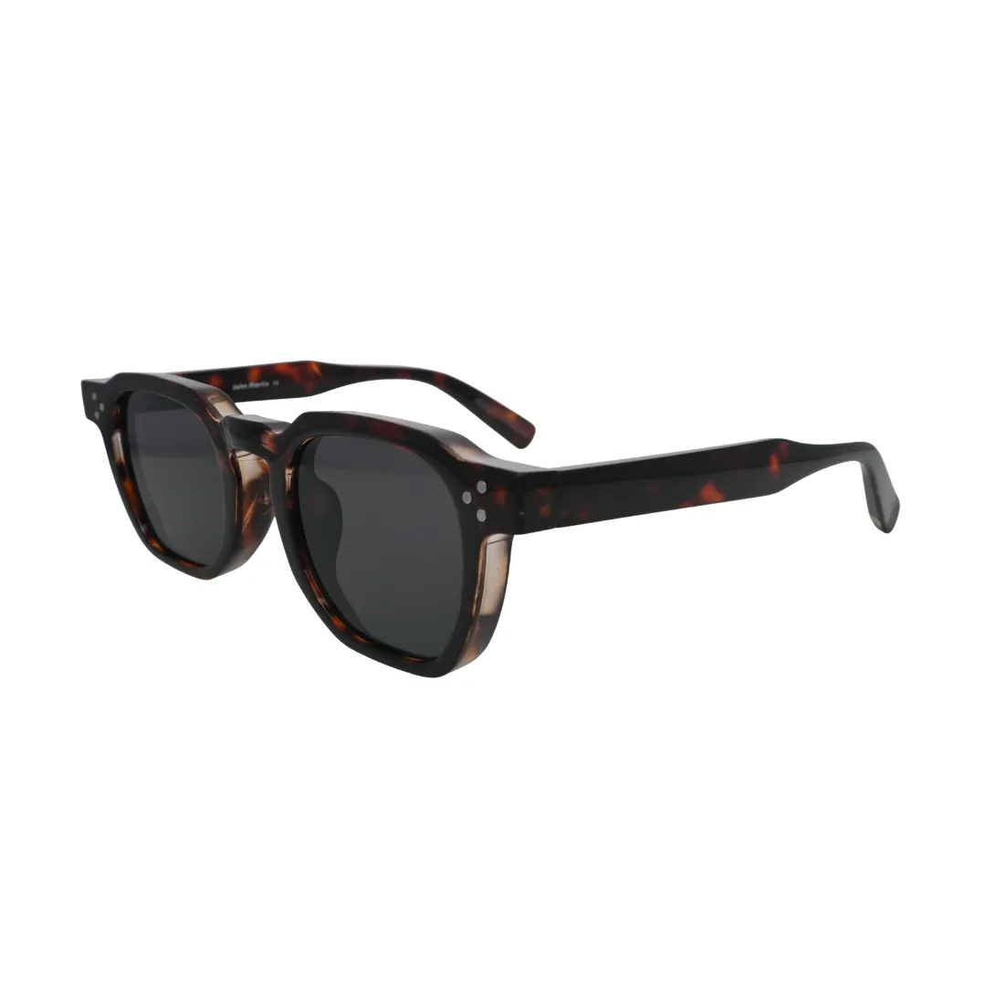 Three-quarter angle view of chunky tortoise shell square sunglasses showing full tortoise temple pattern and silver rivet hinge detail