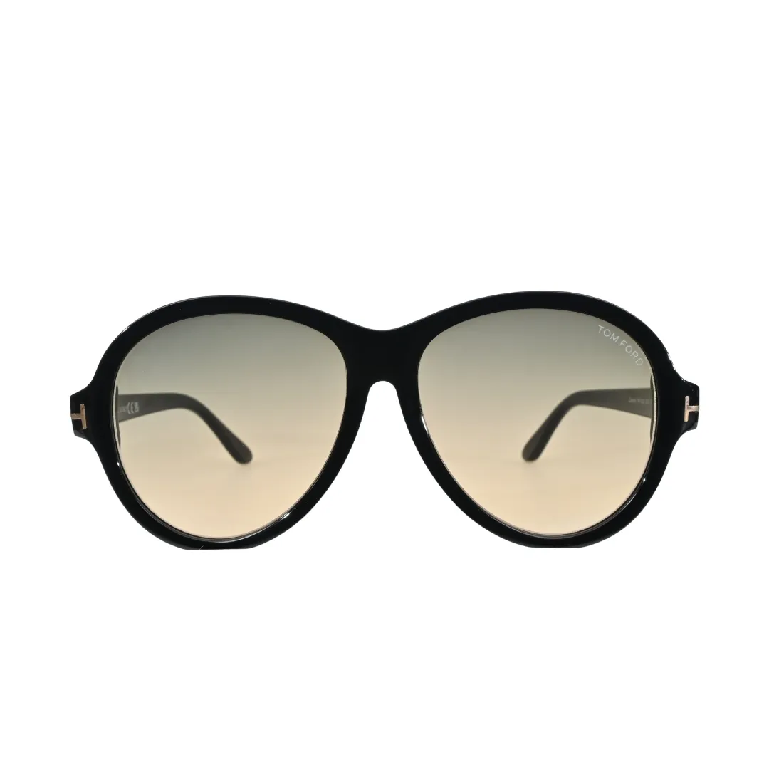 Tom Ford Camryn TF1033 01B front-facing view showing oversized round black frame and warm beige gradient lenses